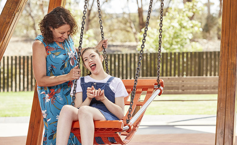 Ph2 HR Giulia and daughter on swing laughing web